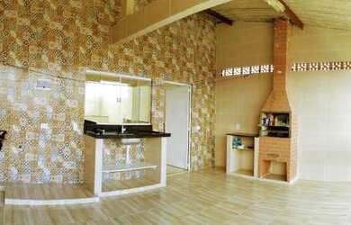 Imagem: A casa possui 2 Dormitórios, 3 Banheiros, 1 Vaga na garagem