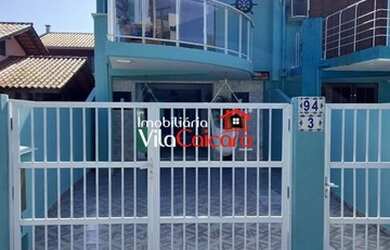 Imagem: A casa possui 2 Dormitórios, 2 Banheiros, 2 Vagas na garagem