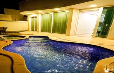 Imagem: A casa em condomínio possui 3 Dormitórios, 4 Banheiros, 2