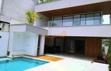 Imagem: A casa em condomínio possui 5 Dormitórios, 5 Banheiros, 3