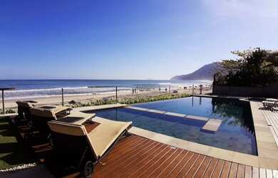 Imagem: A casa possui 5 Dormitórios, 5 Banheiros, 5 Vagas na garagem