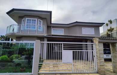 Imagem: A casa em condomínio possui 5 Dormitórios, 5 Banheiros, 4