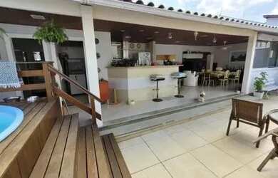 Imagem: A casa possui 3 Dormitórios, 4 Banheiros, 2 Vagas na garagem