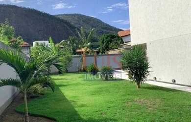 Imagem: A casa possui 4 Dormitórios, 5 Banheiros, 5 Vagas na garagem