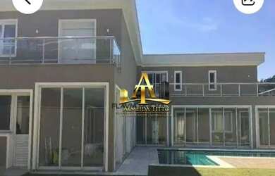 Imagem: A casa em condomínio possui 4 Dormitórios, 5 Banheiros, 5