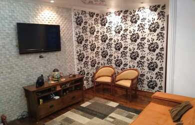 Imagem: A casa possui 3 Dormitórios, 2 Banheiros, 2 Vagas na garagem