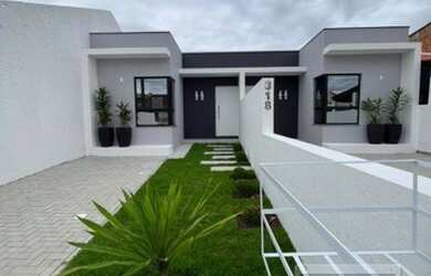 Imagem: A casa possui 2 Dormitórios, 2 Banheiros, 2 Vagas na garagem