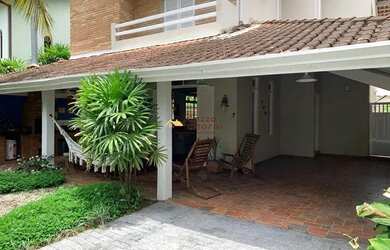 Imagem: A casa possui 3 Dormitórios, 3 Banheiros, 2 Vagas na garagem