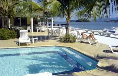 Imagem: A casa possui 5 Dormitórios, 5 Banheiros, 4 Vagas na garagem