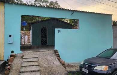 Imagem: A casa possui 2 Dormitórios, 1 Banheiro, 2 Vagas na garagem