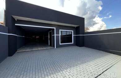 Imagem: A casa possui 3 Dormitórios, 2 Banheiros, 4 Vagas na garagem