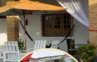 Imagem: A casa possui 5 Dormitórios, Acomodam 20 pessoas, 4 Vagas na