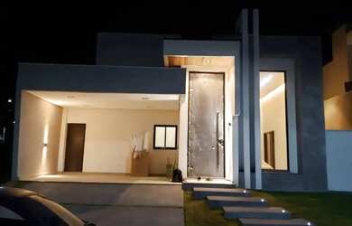 Imagem: A casa possui 3 Dormitórios, 3 Banheiros, 4 Vagas na garagem