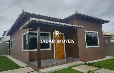 Imagem: A casa possui 3 Dormitórios, 3 Banheiros, 3 Vagas na garagem