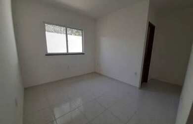 Imagem: A casa possui 2 Dormitórios, 1 Banheiro, 2 Vagas na garagem