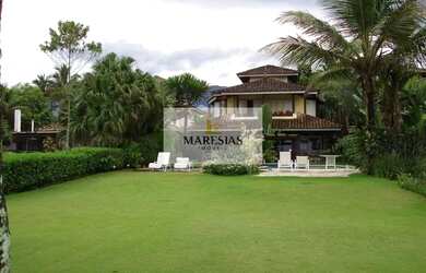 Imagem: A casa possui 4 Dormitórios, 4 Banheiros, 345.000m² de Área