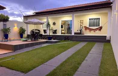 Imagem: A casa possui 2 Dormitórios, 2 Vagas na garagem e está localizado