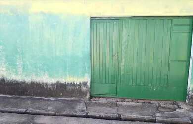 Imagem: A casa possui 3 Dormitórios, 1 Banheiro, 1 Vaga na garagem