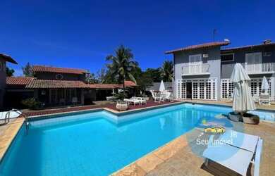 Imagem: A casa possui 5 Dormitórios, 4 Banheiros, 3 Vagas na garagem