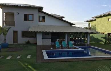 Imagem: A casa possui 5 Dormitórios, 5 Banheiros, 5 Vagas na garagem