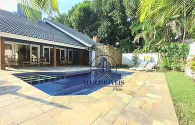 Imagem: A casa em condomínio possui 4 Dormitórios, 5 Banheiros, 5