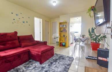 Imagem: O apartamento possui 2 Dormitórios, 1 Banheiro, 1 Vaga na garagem