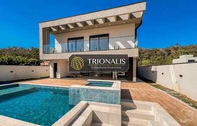 Imagem: A casa em condomínio à venda possui 3 Dormitórios, 5 Banheiros