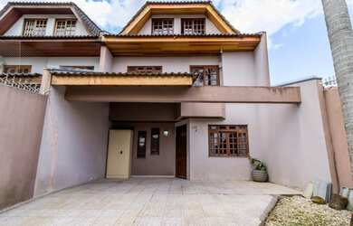 Imagem: A casa possui 5 Dormitórios, 4 Banheiros, 2 Vagas na garagem