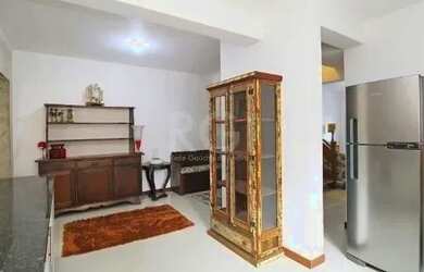 Imagem 14: Casa em Porto Alegre, no bairro Hípica, com 3 dormitório s , e 3 banheiros,...