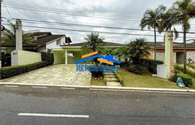 Imagem: A casa em condomínio possui 4 Dormitórios, 5 Banheiros, 3