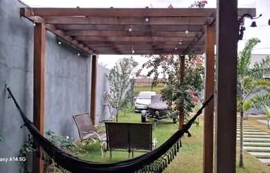 Imagem: A casa possui 3 Dormitórios, 2 Banheiros, 4 Vagas na garagem