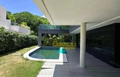 Imagem: A casa em condomínio possui 5 Dormitórios, 5 Banheiros, 3