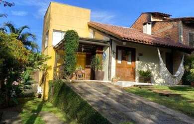 Imagem: A casa em condomínio possui 3 Dormitórios, 3 Banheiros, 3