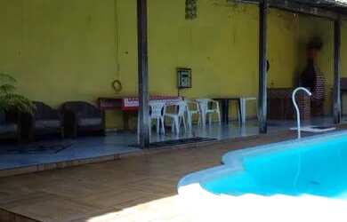 Imagem: A casa possui 2 Dormitórios, 2 Banheiros, 3 Vagas na garagem