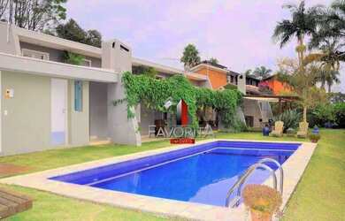 Imagem: A casa em condomínio possui 5 Dormitórios, 5 Banheiros, 5