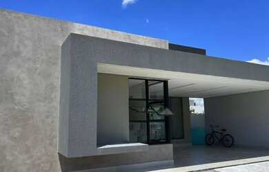 Imagem: A casa possui 3 Dormitórios, 3 Banheiros, 4 Vagas na garagem