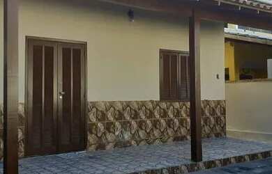 Imagem: A casa possui 2 Dormitórios, 1 Vaga na garagem e está localizado