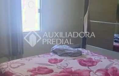 Imagem 11: Terreno de 520 m² arborizado com casa de alvenaria de 2 dormitórios...