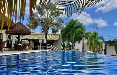 Imagem: A casa possui 3 Dormitórios, 3 Banheiros, 4 Vagas na garagem