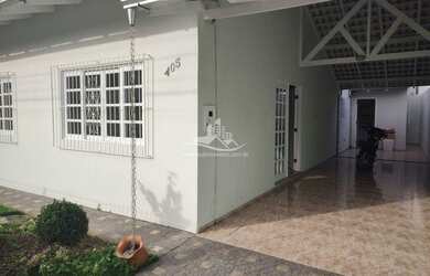 Imagem: A casa possui 3 Dormitórios, 3 Banheiros, 2 Vagas na garagem