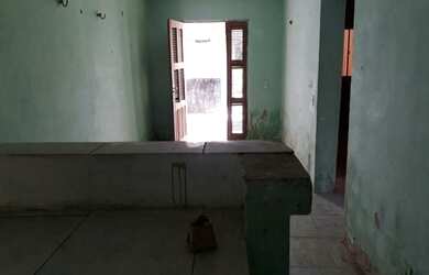 Imagem: A casa possui 3 Dormitórios, 1 Banheiro, 1 Vaga na garagem