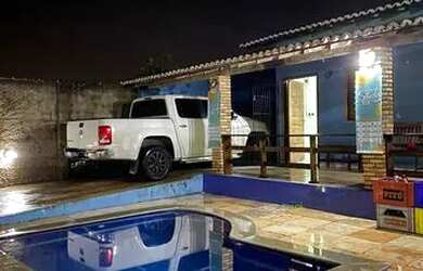 Imagem: A casa possui 5 Dormitórios, 5 Vagas na garagem e está localizado