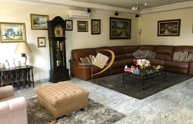 Imagem: A casa possui 3 Dormitórios, 5 Banheiros, 3 Vagas na garagem