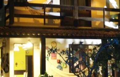 Imagem: A casa possui 4 Dormitórios, 4 Banheiros, 5 Vagas na garagem