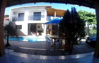 Imagem: A casa possui 3 Dormitórios, 4 Vagas na garagem e está localizado