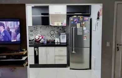 Imagem: O apartamento possui 2 Dormitórios, 1 Banheiro, 1 Vaga na garagem