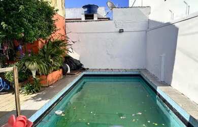 Imagem: A casa possui 5 Dormitórios, 5 Banheiros, 3 Vagas na garagem