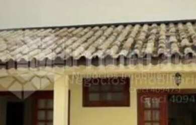 Imagem: A casa possui 2 Dormitórios, 4 Banheiros, 3 Vagas na garagem