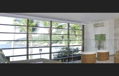 Imagem 3: Jequiti Residence no Guarujá. Casa pé na areia, frente ao mar