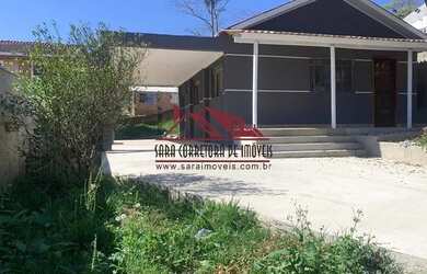 Imagem: A casa possui 2 Dormitórios, 1 Banheiro, 3 Vagas na garagem